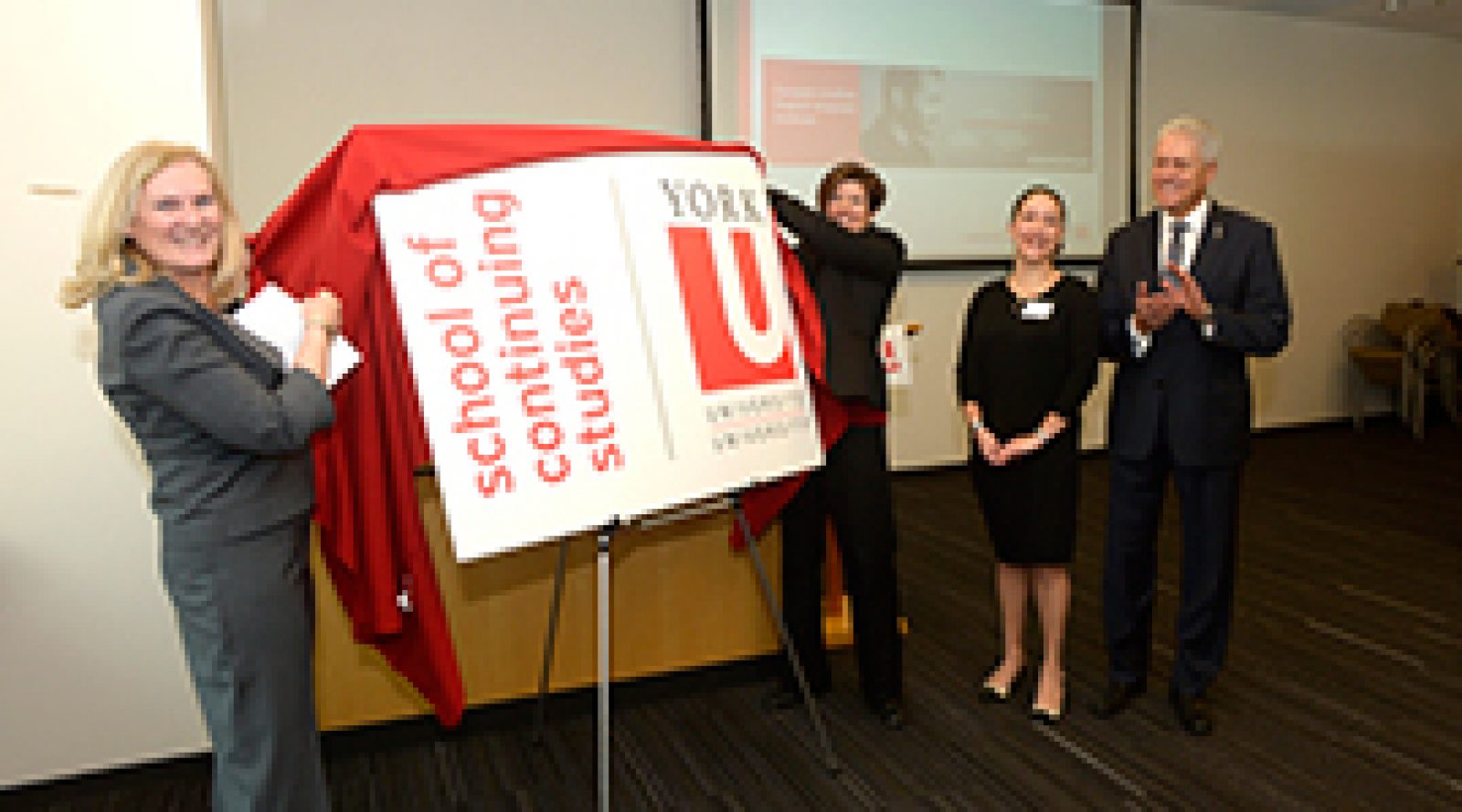 Vice president-academic and provost Rhonda Lenton, left, York University executive director-continuing and professional education Tracey Taylor-O’Reilly, student Sabrina Agricola and president and vice-chancellor Mamdouh Shoukri help launch the York University School of Continuing Studies