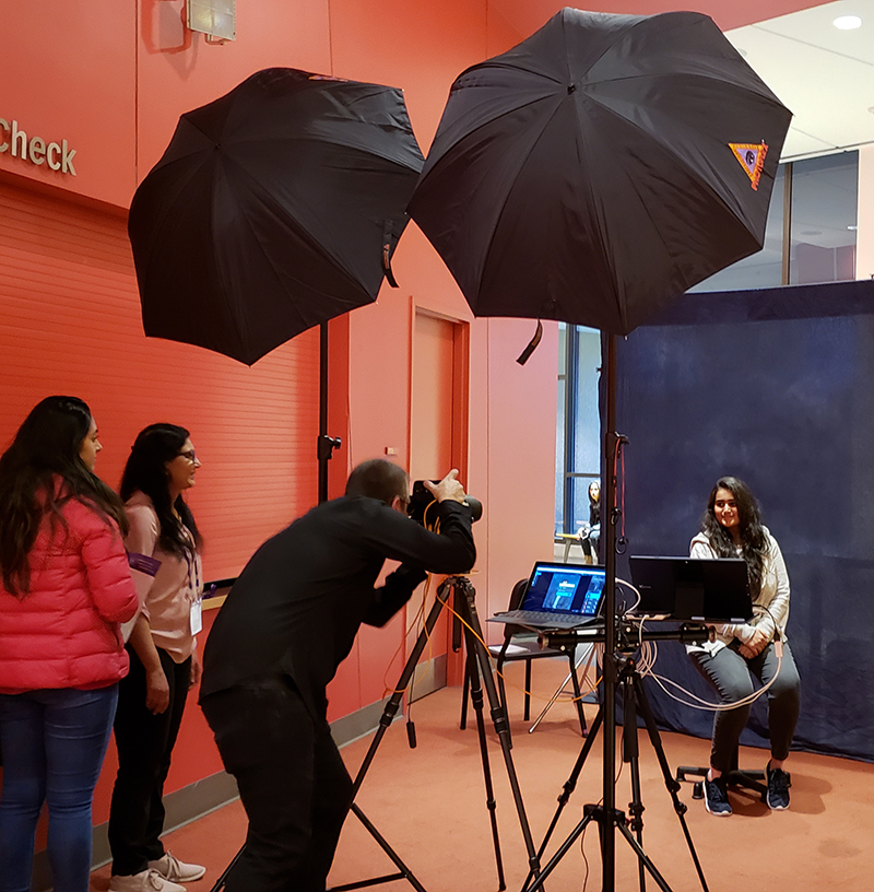 A student getting her professional photograph taken