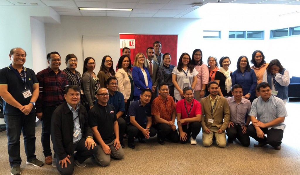 Representatives from various educational institutions and the York University School of Continuing Studies senior management team