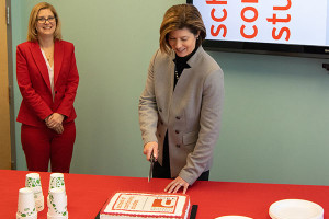 Tracey cutting cake